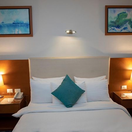 Rehana Plaza Hotel Cairo Exterior photo A bedroom at the hotel